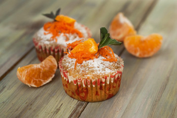 Carrot Healthy Muffins Cupcakes Buns on a WoodenRustic board. Homemade Food.