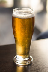 Gold color frosty beer