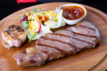 Grilled beef steak with salad