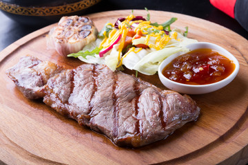 Grilled beef steak with salad