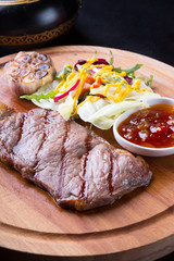 Grilled beef steak with salad