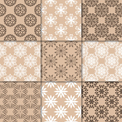 Brown beige floral ornaments. Collection of seamless patterns