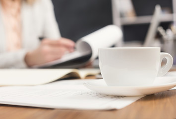 Close up of woman's hands with documents