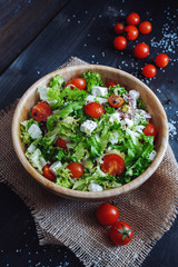 Fresh lettuce, feta cheese and cherry tomato salad