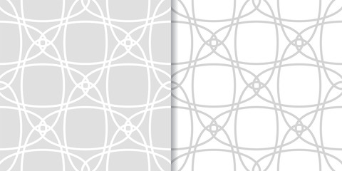 Light gray geometric ornaments. Set of seamless patterns