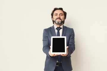 Businessman using tablet computer