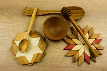 Handmade various wooden utensils. Kitchen equipment concept. Wooden desk table