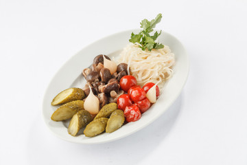 Pickled vegetables on white plate