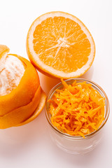 oranges and juice on a white background