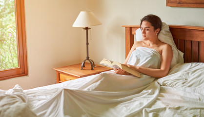 Girl reading big book