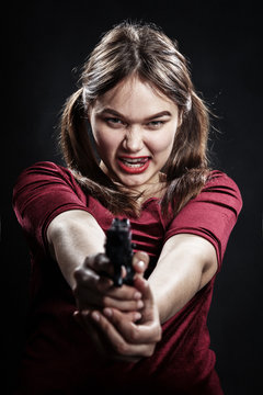 angry girl with gun