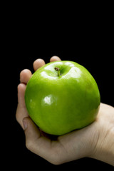 Grüner Apfel in Hand 1