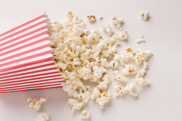 Bucket of popcorn on white background