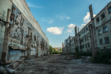 Apocalyptic concept, abandoned city background, ruined buildings, decay constructions after...