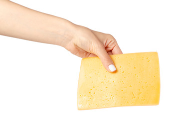 A slice of cheese in a hand on a white background isolation