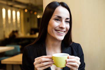 Happy gorgeous Business woman with cup of coffee during lunch time