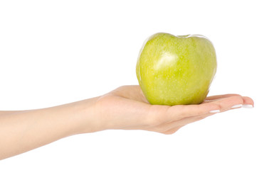 Apple in hand on white background isolation