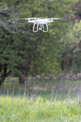 Modern drone flying outdoor, RF photo, no logos or trademarks