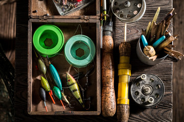 Closeup of fishing tackle with floats, hooks and rods