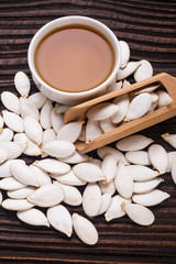 pumpkin seed oil on a rustic background