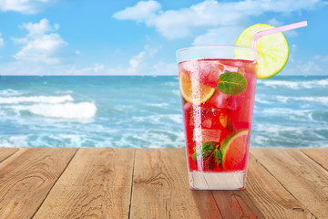 glass of cold red cocktail
