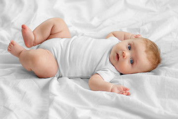 Portrait  baby on the bed - 205786447