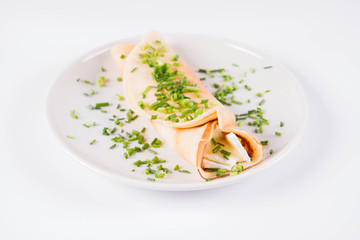 Pancake with brie cheese and chives