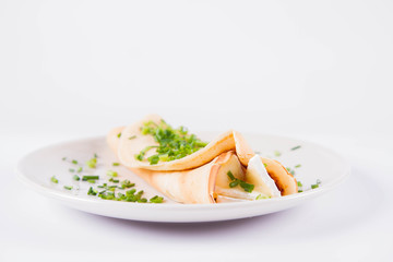 Pancake with brie cheese and chives