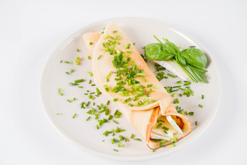 Pancake with brie cheese and chives