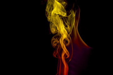 Obraz premium Colored smoke on black background