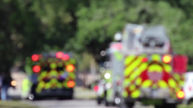 ems and firetruck at traffic accident-intentionally out of foucs