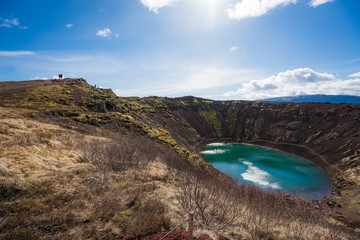 Visitors climbing around Kerid Crater Lake, Iceland