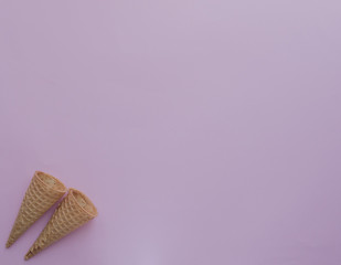 Ice cream cones on pink background