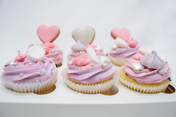 Pastry shop, confectionery. Sweet dessert. Cake, cupcake with hearts on white isolated background