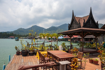 Cafe on the veranda in the fishing village of Bang Bao tropical island