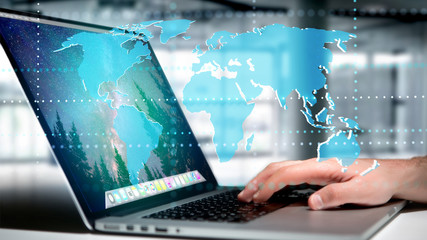 Businessman holding a Connected world map on a futuristic interface - 3d render