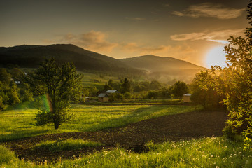 Obraz premium Majestic sunset in the mountains landscape.