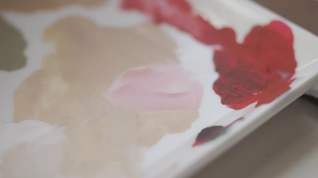 Brush mixing watercolor paint
