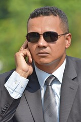 Security Guard Listening Wearing Suit And Tie