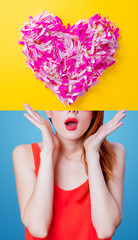 Young redhead girl and flowers heart on blue and yellow background