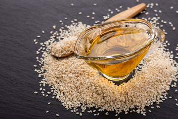 fresh sesame seeds on a rustic background