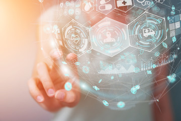 Businesswoman using digital medical sphere 3D rendering