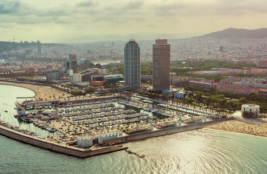 Barcelona aerial,  Port Olimpic with boats and city skyline, Spain. Vintage colors