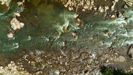 Aerial view of mountain river in summer.