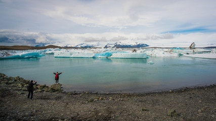 Fototapeta na wymiar People at Jokulsarlon Glacier Lagoon Lake, Iceland