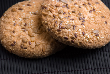 Cookies with sesame and sunflower seeds on table. Healthy eating