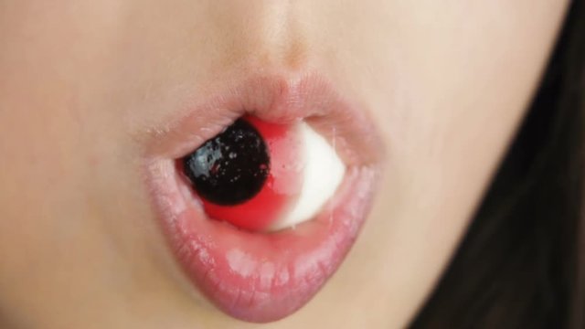 Candy eyes. The eye is in the child's mouth.