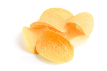 heap of potato chips on white background close-up