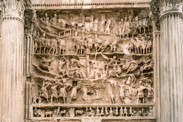 Roman Forum with details of Triumphal Marble Arch of Septimius Severus in Rome. Italy capital...