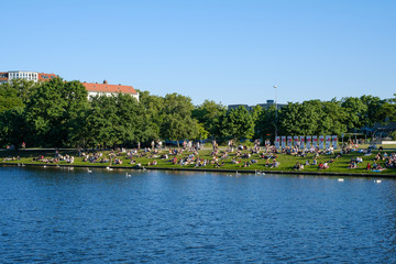 People at riverside  in Berlin Kreuzberg 